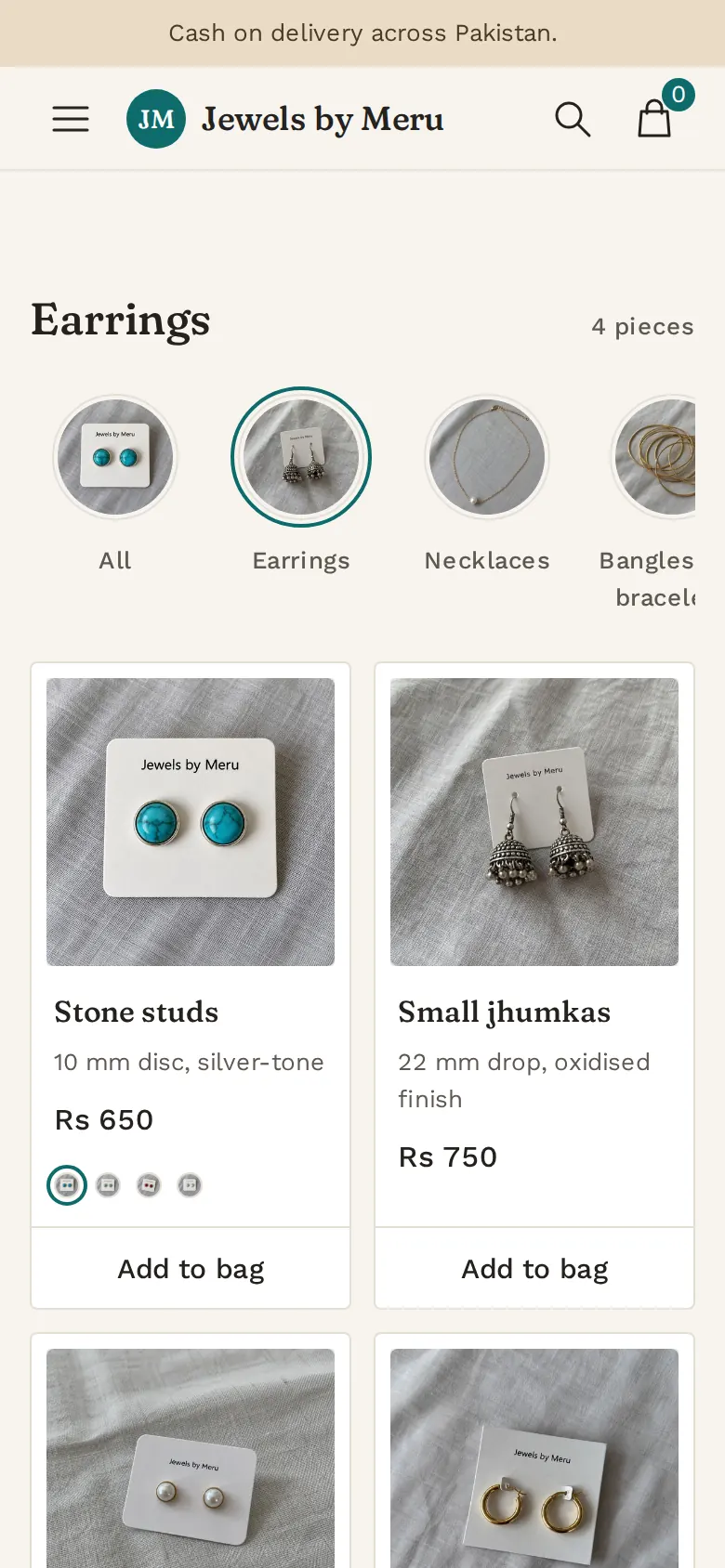 The earrings page of Jewels by Meru on a phone, with product cards, prices and Add to bag buttons.
