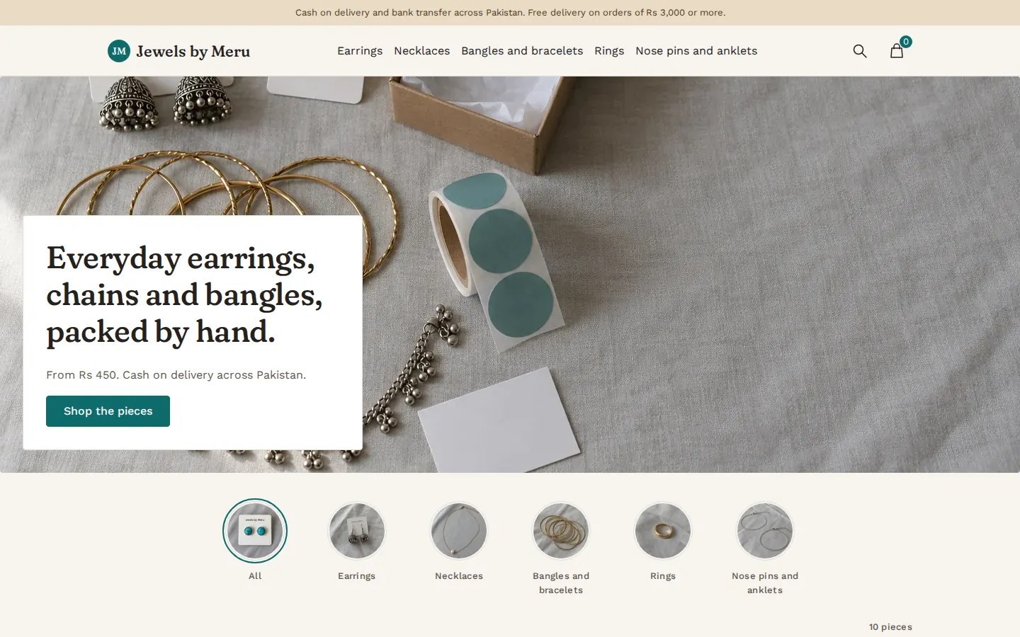 The Jewels by Meru online store on a computer screen, with earrings, chains and bangles on its homepage.